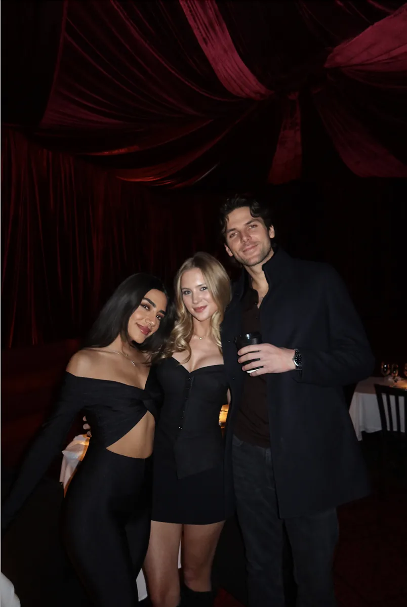 @miaachalhoub @mollymattporter and @philipp.davis pose beneath dramatic red drapery at Caviar Café during the Tsar Varvatsi tasting event. The moody, candlelit ambiance captures the chic and sophisticated tone of the evening in NYC