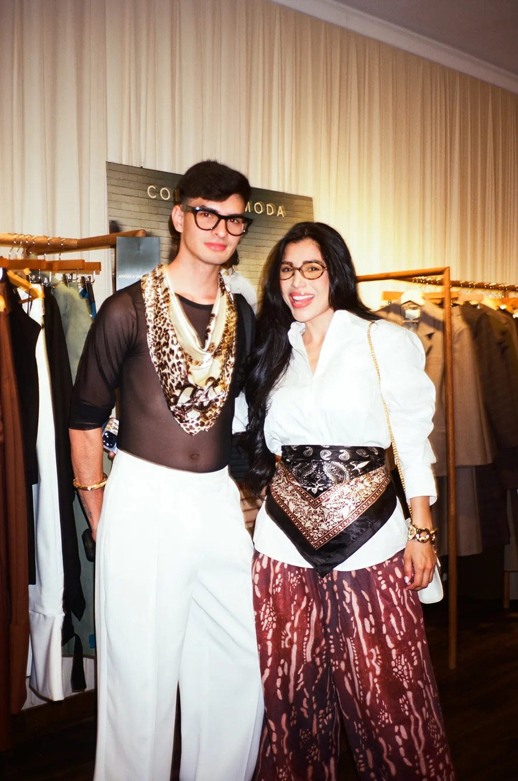 Guests pose in bold fashion looks during the Colombiamoda Oficial x Storytime launch event at The Canvas NYC.