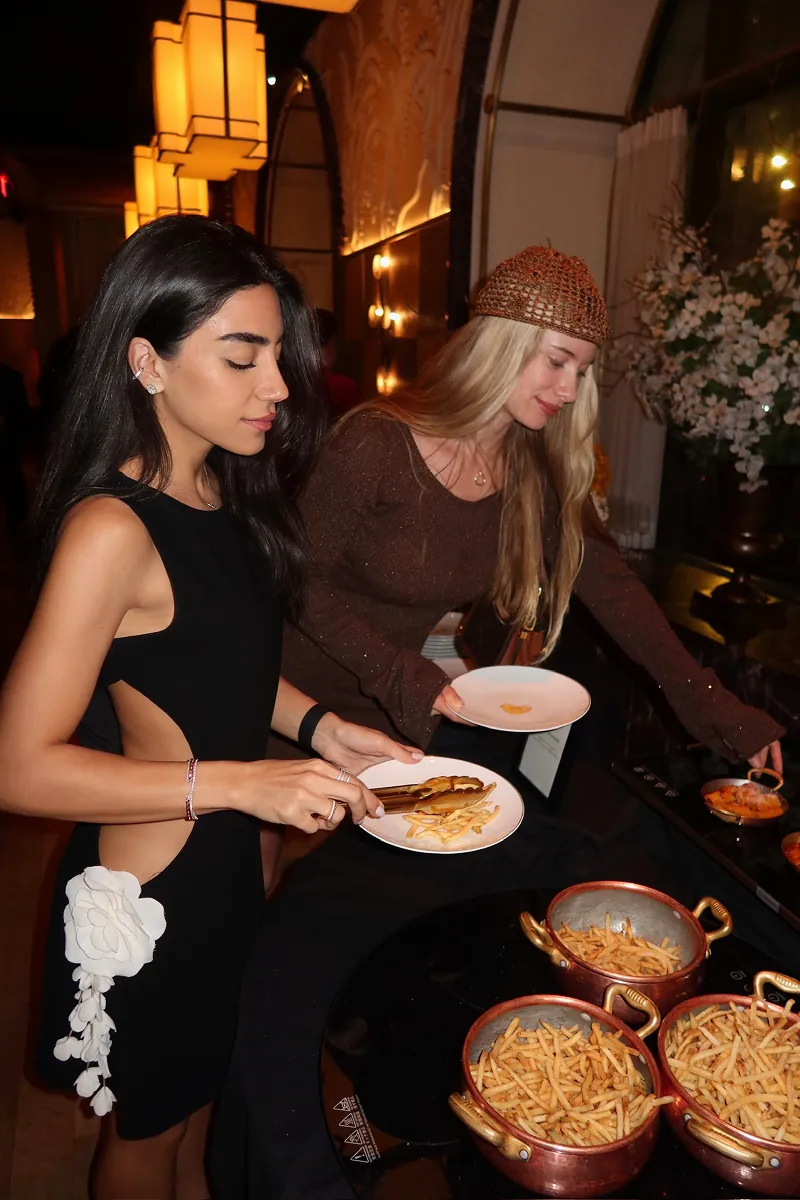Storytime creators enjoying signature Beefbar NYC bites and fries during the restaurant’s 2-year anniversary casino night celebration in New York City.